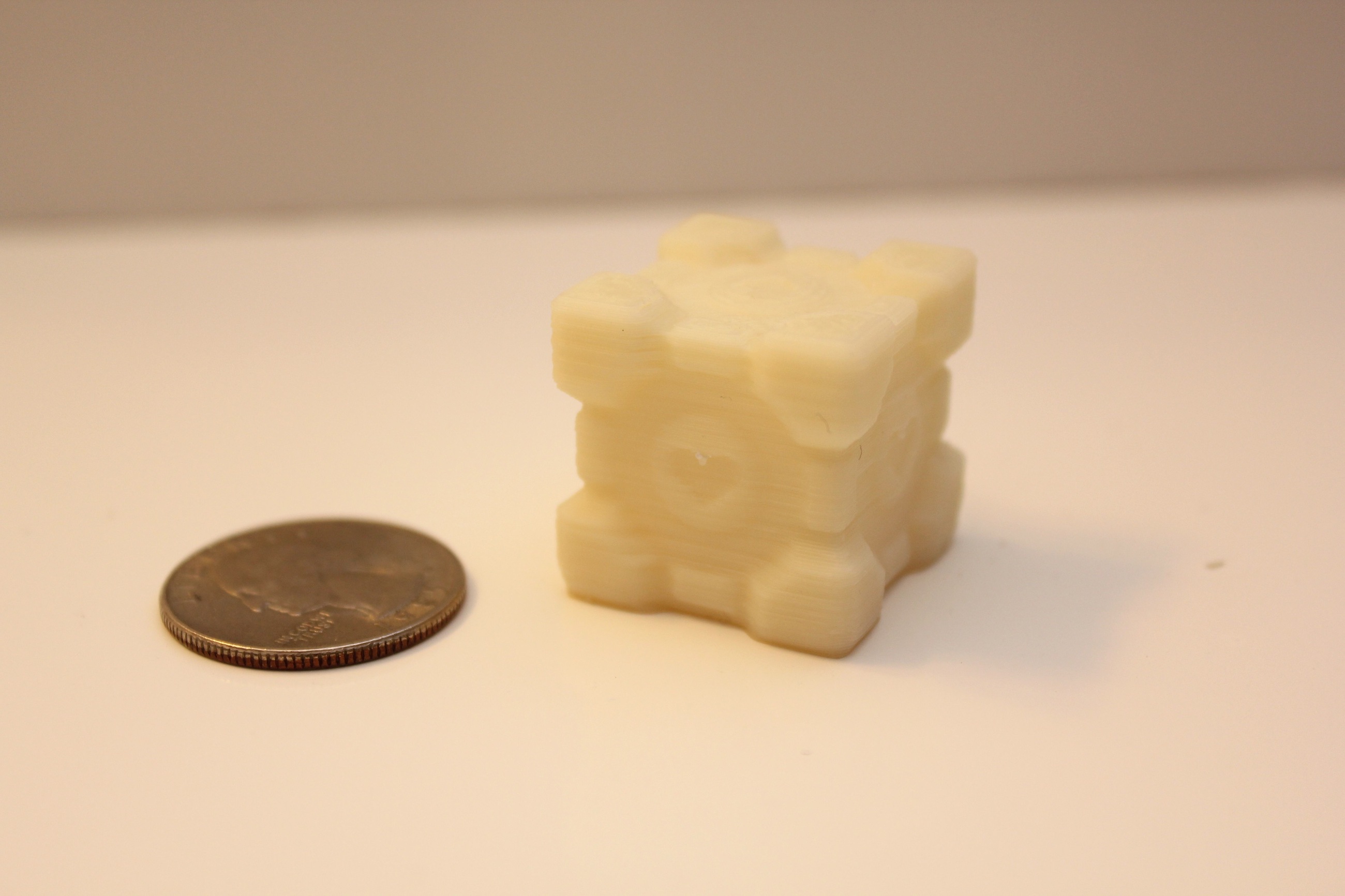 Companion Cube and a quarter for comparison printed on PrintrBot Plus